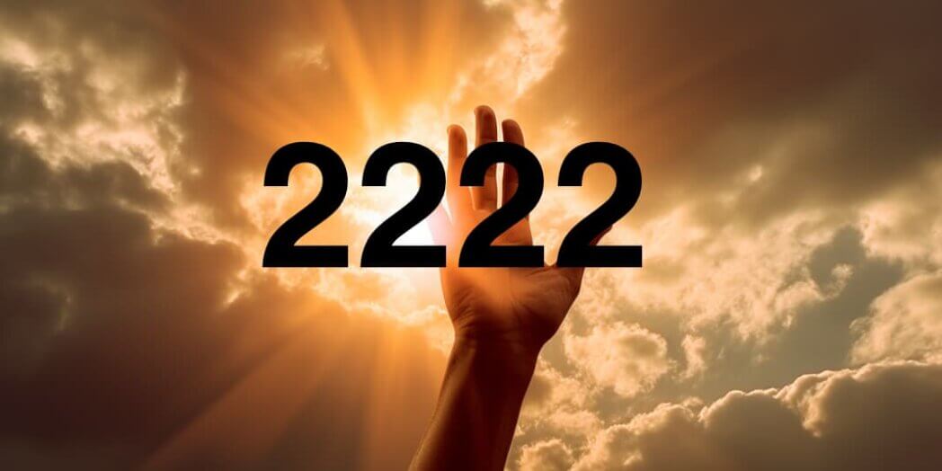An open hand raised against a sunny outdoor, with rays of sunlight shining through. The text '2222' is prominently displayed