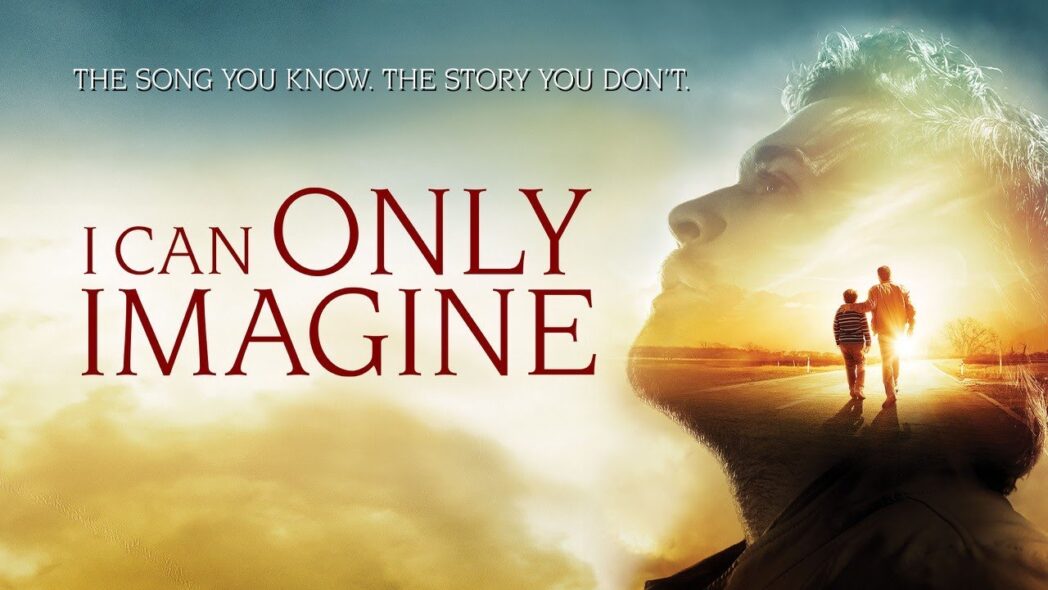 Movie cover of 'I Can Only Imagine' (2018). Blurry silhouette of a man looking up at the sky, with a man and child walking away.