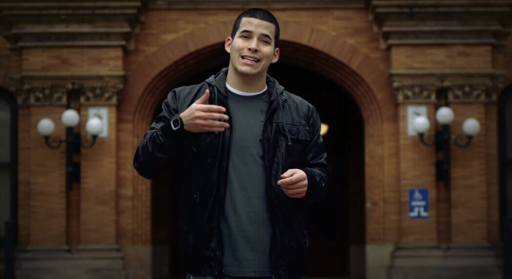 a shot of Jefferson Bethke wearing a black leather jacket trying to explain something