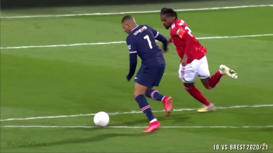 Kylian Mbappé playing football