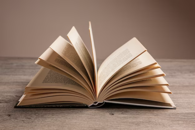 Open book on a wooden table